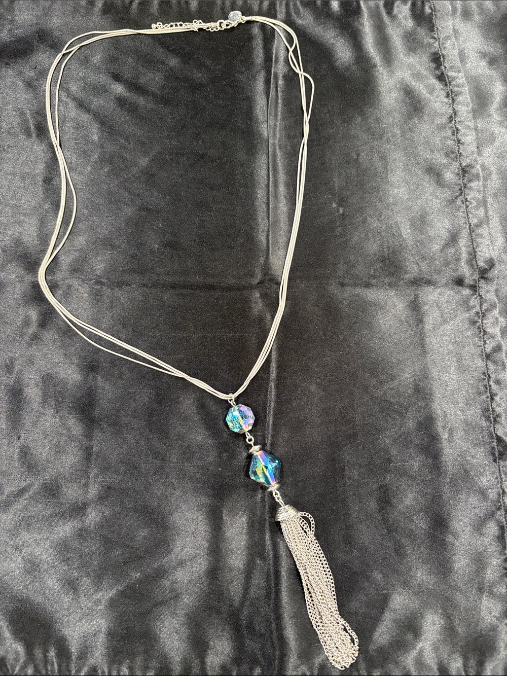 Silver Multi-Strand Necklace with Iridescent Blue-Green Gems and Tassel
